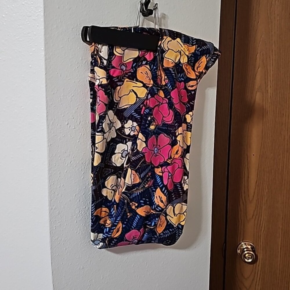 NWOT TC2 lularoe floral leggings with vibrant colors.